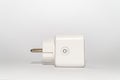 White electrical plug with the power sign on it isolated on a white background Royalty Free Stock Photo
