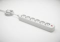 White electrical power strip with six outlets isolated on white background Royalty Free Stock Photo