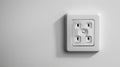 White electrical wall socket on a blank white wall. Concept of home electricity, power supply, plug, wall appliance Royalty Free Stock Photo