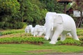 White elephant statue in the green garden Royalty Free Stock Photo