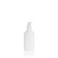 White elliptical medium PEHD bottle container with transparent lotion pump on white background. Template of a bottle for cosmetics Royalty Free Stock Photo