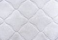 White embossed porcelain stoneware. Background and texture of porcelain tiles