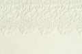 White embroidered lace on white wood Royalty Free Stock Photo