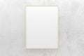 White empty blank picture or poster frame template mock up design hanging on concrete wall background in room with black frame Royalty Free Stock Photo