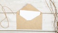 White empty card with of envelope. Blank card styled mockup on wooden background. To do list, greeting card or writing a letter Royalty Free Stock Photo