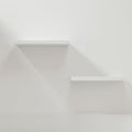 White empty cube shelf in the empty room, 3d rendering