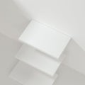 White empty cube shelf in the empty room, 3d rendering Royalty Free Stock Photo