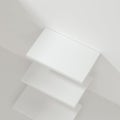 White empty cube shelf in the empty room, 3d rendering