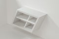 White empty cube shelf in the empty room, 3d rendering Royalty Free Stock Photo