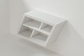 White empty cube shelf in the empty room, 3d rendering