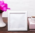 White empty frame with place for text on the table Royalty Free Stock Photo