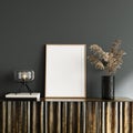 White empty mockup picture frame on wooden console with dry plant decoration and glass table lamp Royalty Free Stock Photo