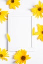 White empty picture frame mock up with yellow flower on white background Royalty Free Stock Photo