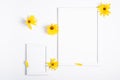 White empty picture frame mock up with yellow flower on white background Royalty Free Stock Photo