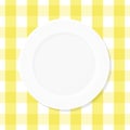 White empty plate on yellow checkered tablecloth. Top view. Vector illustration, flat design Royalty Free Stock Photo