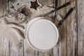 White empty plates, gray napkin, spices, forks on a light wooden background. Top view. Copy space Royalty Free Stock Photo