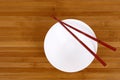 White empty rice bowl with wooden chopsticks Royalty Free Stock Photo