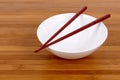 White empty rice bowl wooden chopsticks bamboo background Royalty Free Stock Photo