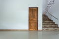 White empty room interior with wooden door Royalty Free Stock Photo