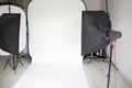 White empty setup photographer modern photo studio room with professional light equipment mockup Royalty Free Stock Photo