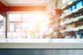 White empty table for products presentation in a pharmacy drugstore interior Royalty Free Stock Photo
