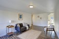 White entrance room with comfortable tufted sofa