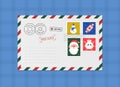 White envelop with a Christmas cute postage stamps