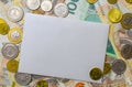 white envelope, blank note on money background, for finance and inflation Royalty Free Stock Photo