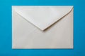 white envelope blank note pinned to a blue notice board Royalty Free Stock Photo