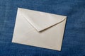 white envelope blank note pinned to a blue notice board Royalty Free Stock Photo