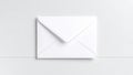 White envelope on a minimalist gray background, top view Royalty Free Stock Photo