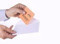 White envelope with paper note with man hand on the white background. I am sorry concept