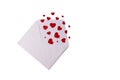 White envelope with red small paper hearts isolated on white background. Valentine's Day, love concept. Royalty Free Stock Photo