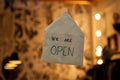 White envelope on a shop window with the words