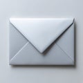 A white envelope on a white surface Royalty Free Stock Photo