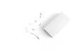 White eraser on a white surface with a few eraser shavings scattered around, emphasizing simplicity and cleanliness Royalty Free Stock Photo