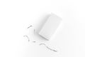 White eraser on a white surface with a few eraser shavings scattered around, emphasizing simplicity and cleanliness Royalty Free Stock Photo