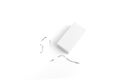 White eraser on a white surface with a few eraser shavings scattered around, emphasizing simplicity and cleanliness Royalty Free Stock Photo