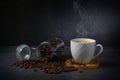 White espresso cup and coffee beans dark table background with copy space. Arabica grains, Coffee shop Royalty Free Stock Photo