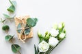 White eustoma flowers and gift box Royalty Free Stock Photo