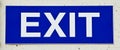 White EXIT text on blue.