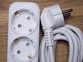 White extension cable with socket and plug, close-up Royalty Free Stock Photo