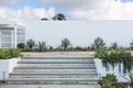 White exterior of building with steps