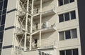 White external metal emergency staircase on building Royalty Free Stock Photo