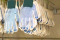 White fabric gloves with a blue protective layer. Royalty Free Stock Photo