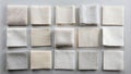 White Fabric Swatches A Detailed Look at Soft Crisp Samples in a Neat Grid Pattern on a Light
