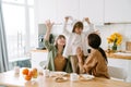 White family making fun having breakfast together Royalty Free Stock Photo