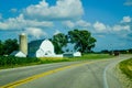 White Farm with Silo on a Curvy Country Road Royalty Free Stock Photo