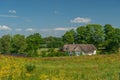 White farmhouse, with thatched roof Royalty Free Stock Photo