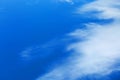 White feather clouds in a blue sky Royalty Free Stock Photo